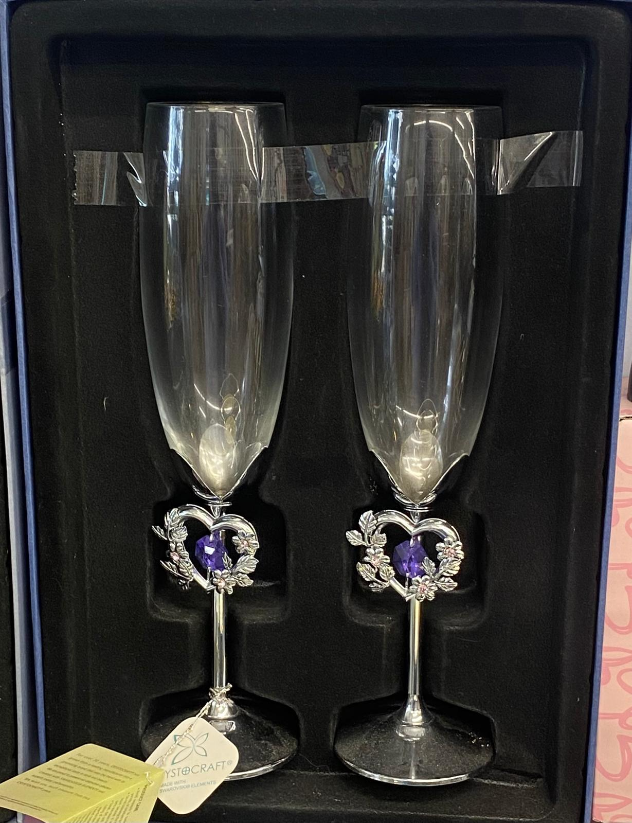 Crystocraft champagne flute set of 2 with silver heart floral stems and purple crystal accents in navy gift box