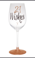 21 Wishes wine glass with black script lettering and rose gold glitter base